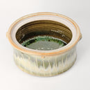 Green Lidded Decor Piece With Reeds
