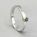 Mixed Metal Blue Topaz Ring